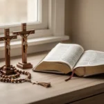 Rosary and prayer book in a softly lit Catholic home prayer corner