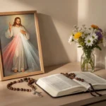 Prayer corner with Divine Mercy image, rosary, diary, and flowers