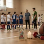 Youth athletes praying with a coach before a soccer match